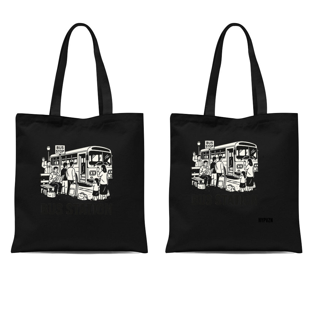 Two black tota bags display a white illustration of people at a bus stop by a bus, with "BUS STATION" subtly shown below the image.